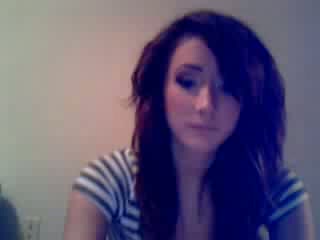 Cute brunette girl with flat tits rubs her pussy on webcam