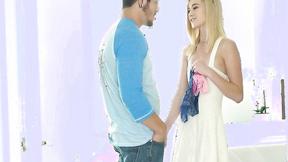 ”Mesmerizing blonde practices her art of seduction”