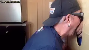 Gloryhole gay enjoys jerking big dick while sucking it
