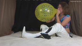 Three Yellow Balloons Blow to Pop -HD