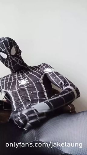 Twink Spiderman caught masturbating his big cock