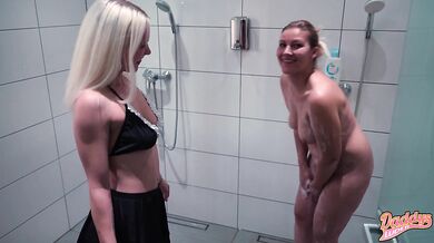 Teen and MILF touch each other's pussies