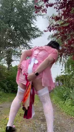 Dressed in a pink maid outfit to go get a package from the mailbox