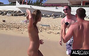 Six horny lesbians go at it on a public beach