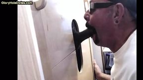 Horny DILF cocksucking BBC in gloryhole