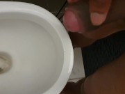 Pissing. Black dick urinal piss and wank