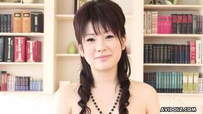 Japanese brunette girl Hina Kawamura masturbating at home uncensored.