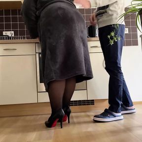 Lustful mother-in-law fucked herself in the kitchen and made her son-in-law cum on her skirt