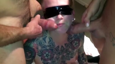 Tattooed blonde man blindfolded in bareback gangbang with DP and oral