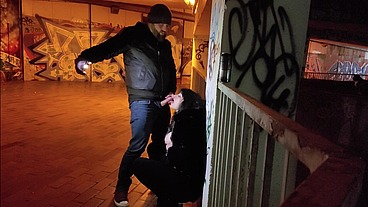 Whore degraded in parking garage