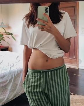 Slim blonde Indian GF teases alone in an amateur video