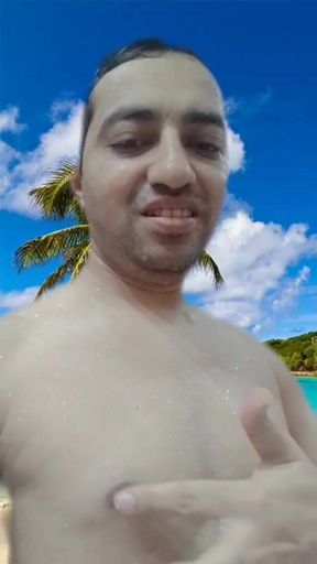 Nude boy on the beach shows his full nude body.