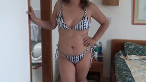 I wear a bikini to go to the beach to show off and make the cocks very hard