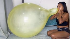 Sexy Camylle Blows To Pop Huge Yellow Belbal Soap Balloon