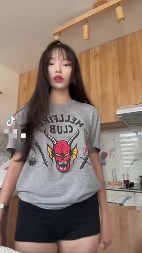 Cute Asian teen TikTok star exposes her perky tits and tight ass
