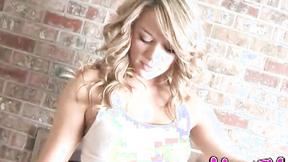 ”Hot blonde dripping wet as she soaks her shirt”