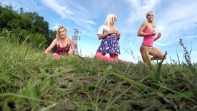 Outdoor fitness in shortest skirts on a windy day