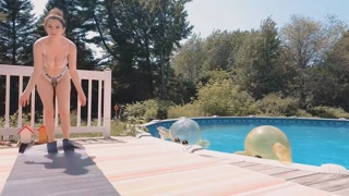 Petite brunette with big tits had fun by the pool