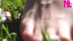 Nyllady Walking Barefoot on Th Grass in a Park