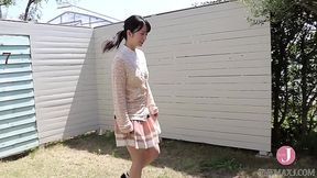 Cute Asian babe has her upskirt filmed while riding bike