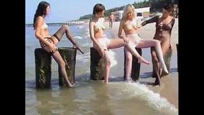 young innocent brunette plays outside at the beach