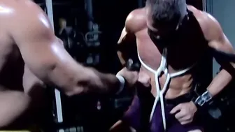 Bryce Pierce clamps and toys with bound Luca Ciccone's nipples on the wrestling mat