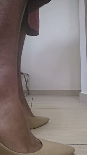 Wearing my new skirt with high heels