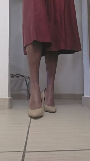 Wearing my new skirt with high heels