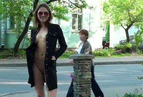 Fabulous and skinny young exhibitionist shows her goodies on the street