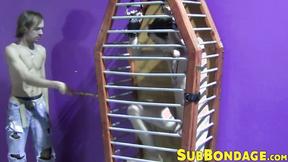 ”Caged twink whipped & tormented hard ends up masturbating”