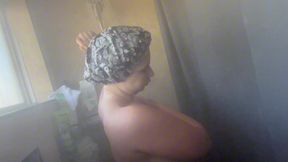 Chubby goth girl takes a steamy shower with big natural tits and a round ass.