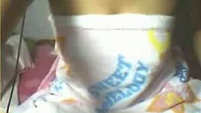 Pretty amateur nympho works on webcam and flashes her big titties