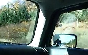 Blonde and brunette play with each other in the car