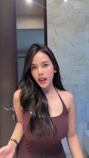 Indonesian beauty shows off her big tits in a solo scene