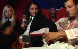 Threesome in a movie theater