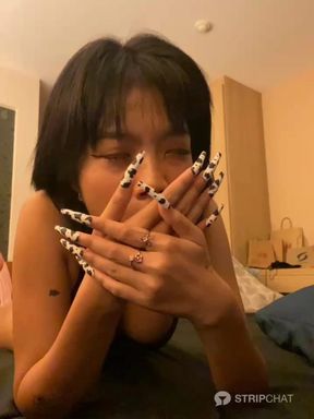 Emma Thai Enjoys Long Nails for Her Holes in Live Show