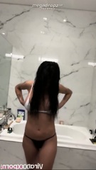 Mia Khalifa Teases in See Thru Tank Top During Steamy Nude Shower Show