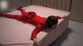 xr75-The girl's hands were tied to the bed.