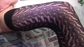 Brunette German slut in stockings fucks herself with orange dildo