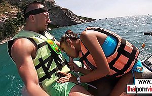 Thai teen girlfriend sucks boyfriends big cock outdoor