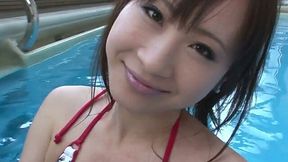 Busty Asian slut performs steamy masturbation in pool area