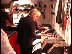 Blonde stripper at the sex fair