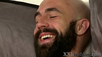 Bearded bald hunk with big dick gets sucked