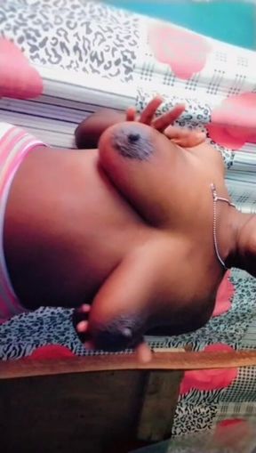 Hot African Queen Massaging Her Big Boobs