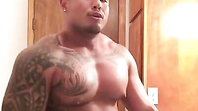 Muscled Latino guy shows his big body and plays with cock