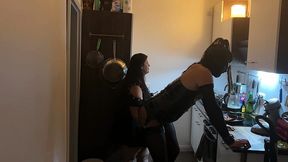 Fetish babe dominates her friend in kinky kitchen encounter