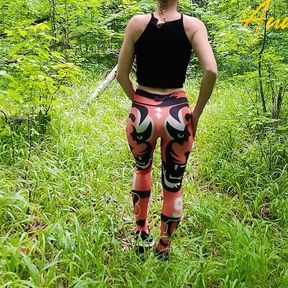 Public masturbation, a girl in leggings walks in nature