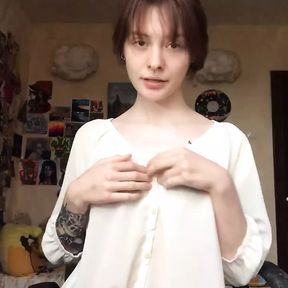 She took off her underwear on camera and showed a smooth pussy.