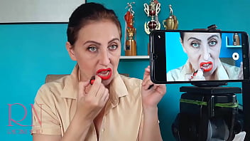 Lips teasing with red lipstick. Red lipstick kissing teasing by Regina Noir.