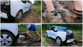 Exclusive BMW I3 car stuck in deep soft mud_muddy and wet high heels and pantyhose feet